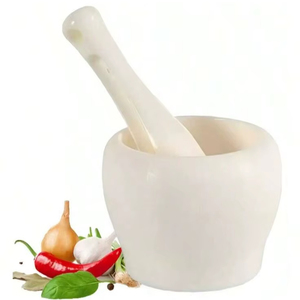 Mortier et pilon en marbre naturel faits à la main pour broyer les herbes, les épices et préparer des recettes traditionnelles - Product Image 1