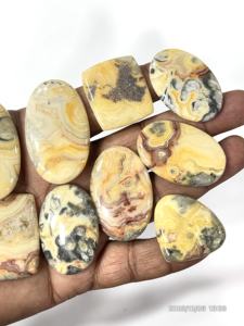 พลอยแจสเปอร์สีเหลืองธรรมชาติทรงหลวมแบบคาโบชอง รูปทรงและขนาดคละกัน ประมาณ 20 ถึง 30 มม. - Product Image 6