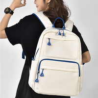 Sac à dos unisexe noir en nylon grande capacité avec port de chargement USB, fermeture éclair, doublure en polyester, idéal pour les voyages, l'école et l'usage quotidien
