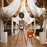 Kiosque photo élégant en bois pour événements et divertissements, compatible avec les appareils photo reflex numériques et les iPad