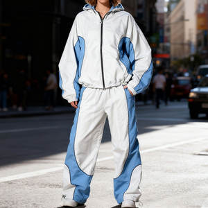 Conjunto Deportivo para Hombre, Chaqueta Cortavientos Ligera de Nailon con Cremallera y Pantalones Deportivos, con Detalles Reflectantes - Product Image 1