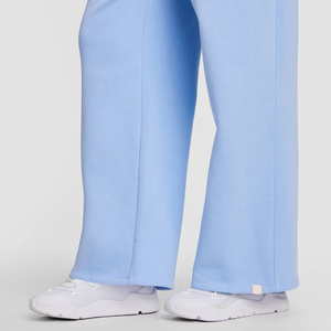 Pantalon de survêtement large bleu clair pour femme, taille mi-haute, avec cordon de serrage, poches latérales, détail de bouton sur le bas, ourlet ouvert - Product Image 4