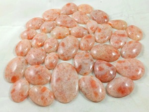 พลอยซันสโตนสีส้มธรรมชาติทรงหลังเบี้ยขัดเงา ขนาด 25-40 มม. ขายส่งจำนวนมาก ของขวัญเครื่องประดับสำหรับเธอ - Product Image 1