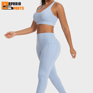 Conjuntos Deportivos de Yoga para Mujer con Logotipo Personalizado de Fábrica, Top Corto y Leggings con Efecto Push-Up para Pilates y Fitness - Product Image 1