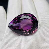 Aigue-marine naturelle taille poire 84,30 carats, grande taille, qualité AAA, lueur violette, coupe et polissage parfaits, certifiée par un tiers