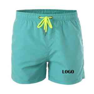 กางเกงขาสั้นผู้ชายดีไซน์ใหม่สำหรับฤดูร้อน มีเชือกผูกเอว สีพื้น สำหรับเล่นกีฬาและออกกำลังกาย รับสกรีนโลโก้ มีกระเป๋าซิป กางเกงวิ่ง - Product Image 6