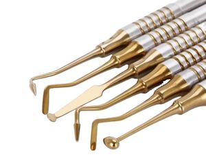 Conjunto de instrumentos de relleno compuesto recubierto de titanio dorado Herramientas de restauración dental Premium con agarre ergonómico - Product Image 1