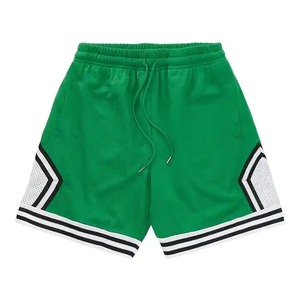 Shorts de basketball décontractés pour hommes, personnalisés OEM, 100 % polyester, avec logo imprimé par sublimation, poches et taille élastique - Product Image 1