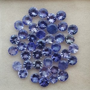 Piedras preciosas sueltas de tanzanita de 5 mm de primera calidad, talladas en forma redonda, facetadas y calibradas, piedra de tanzanita natural para la fabricación de joyas a bajo precio. - Product Image 1