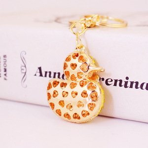 Llavero con lazo de <span class=keywords><strong>patito</strong></span> de diamantes de imitación, colgante para bolso de aleación de zinc en tono dorado, para regalos de invitados de baby shower - Product Image 4