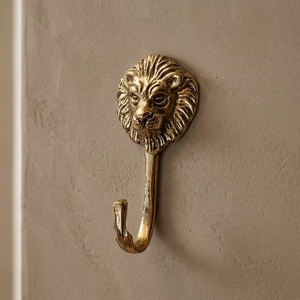 Gancho de Pared con Cabeza de León Antiguo, Perchero Metálico para Ropa, Gancho Individual Resistente, Ecológico, Flexible y Autoadhesivo - Product Image 1