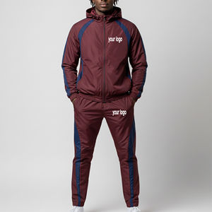 ชุดเซ็ตเสื้อแจ็คเก็ตซิปและกางเกงจ็อกเกอร์ผ้าไนลอน 100% กันลมและกันน้ำ ดีไซน์ทันสมัย น้ำหนักเบา สีสันตัดกัน - Product Image 1