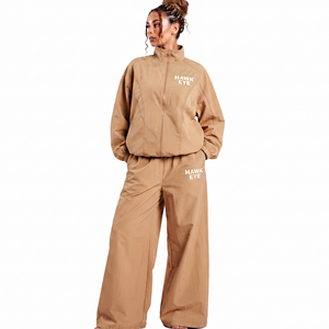 Chaqueta cortavientos de moda para mujer, conjunto deportivo con cuello alto, cremallera completa, hombros caídos, pantalón jogger ancho, transpirable, color liso - Product Image 1