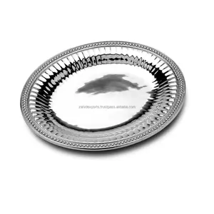 Bandeja decorativa de diseñador con marco de metal y base de vidrio Bandeja acabada en plata con líneas de borde profundo hecha por Zahid exports - Product Image 1