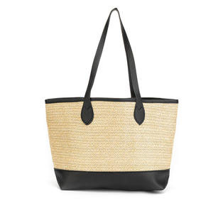 Apportez une touche d'énergie moderne à vos tenues avec ce sac en fil naturel vibrant, doté d'un corps structuré et de bretelles noires élégantes. - Product Image 1