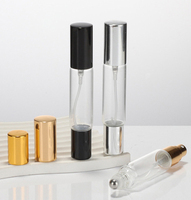 Bouteille en verre de parfum ronde ambre clair Portable à double bouche 10ml 1/3 oz avec pulvérisateur à rouleau en métal pour huile essentielle de parfum