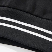 Veste universitaire noire avec manches blanches et broderie lettre G, col rabattu décontracté, coupe classique, pour l'automne