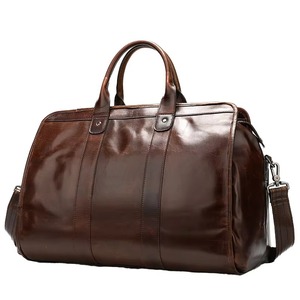 Bolsa de Viaje de Cuero Genuino Moderna y Premium, Color Marrón Oscuro, Unisex, con Cierre, Ligera y Resistente - Product Image 1