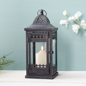 Rustic <b>Black</b> Rectangular Metal <b>Lantern</b> With Embossed Floral Design For Home Decoration - Product Image 1