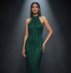 Robe de soirée élégante entièrement faite à la main, couleur vert émeraude, col halter, robe sirène entièrement pailletée, vente en gros - Product Image 1