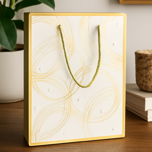 Elegant White Paper Gift Bag with Gold Abstract Swirl <b>Design</b> <b>and</b> Rope Handle Custom Logo <b>Packaging</b> for Wedding Retail or Events - Product Image 1