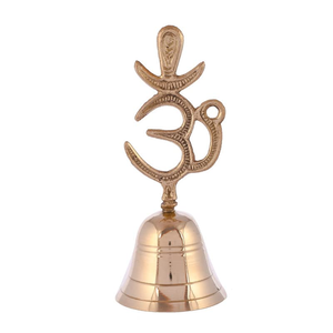 Brass ritual hand bell featuring a prominent Om symbol handle, available at wholesale prices. - Product Image 1
