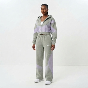 Conjunto deportivo informal de dos piezas para mujer, con sudadera corta con cremallera y bloques de color, y pantalones deportivos de pierna ancha. - Product Image 1