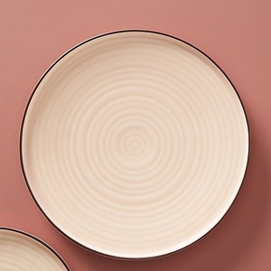 Assiette à dîner en céramique artisanale avec texture à anneaux concentriques et design rond minimaliste pour une décoration moderne de la salle à manger et de la maison - Product Image 1