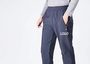 Pantalon de jogging décontracté pour homme en polyester bleu foncé à taille élastique, séchage rapide, avec poches et logo sur la jambe droite, idéal pour l'automne - Product Image 3