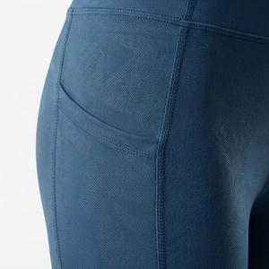 Leggings de Yoga de Cintura Alta hasta el Tobillo con Bolsillos, Diseño Sin Costuras de Nailon y Spandex Azul Sólido - Product Image 5