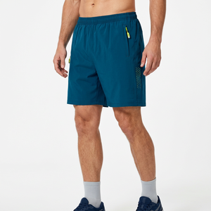 Shorts de course bleus à séchage rapide pour hommes avec poches latérales et motif à pois pour l'été - Product Image 4