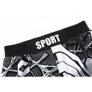 Shorts MMA professionnels pour hommes, logo personnalisé sur le devant, polyester sublimé, séchage rapide, vêtements de sport pour la salle de sport, l'entraînement et les combats - Product Image 4