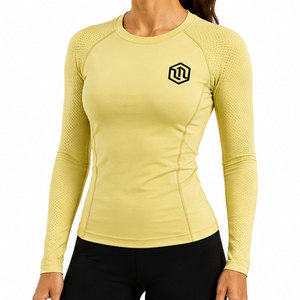 Camiseta Deportiva de Compresión Avanzada para Mujer, Confeccionada con Tecnología de Secado Rápido, Mezcla de Tejidos Flexibles y Comodidad Mejorada - Product Image 1