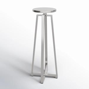 Mesa de Centro con Detalles en Plata Pulida, Base Geométrica Cónica, Tapa Redonda, Estilo Moderno y Compacto para Bares Elegantes - Product Image 1
