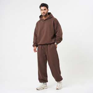 Ensemble de survêtement décontracté pour homme en molleton 100% coton, comprenant un sweat à capuche à manches longues avec cordon de serrage à la taille et un pantalon large - Product Image 1