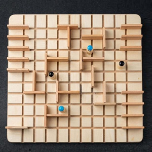 Handcrafted Wooden Maze Game Featuring A Square Grid With Strategic Barriers And Colored Pegs For Engaging Brain Teasing <b>Puzzles</b> - Product Image 1