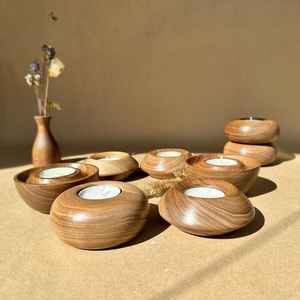 Porte-bougie artisanal en bois, mettant en valeur la beauté du bois naturel et une lumière chaleureuse, idéal pour les espaces de détente paisibles - Product Image 5
