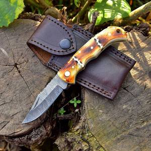 Cuchillo plegable de alta dureza para acampar al aire libre, cuchillo plegable de supervivencia para caza con mango de hueso, cuchillo de bolsillo de acero de Damasco - Product Image 1
