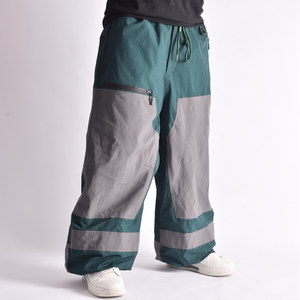 Pantalones de esquí impermeables para hombre con bloques de color, cierre con cordón, poliéster y nailon, pantalones de snowboard para exteriores, corte holgado - Product Image 1