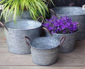 Grand pot à fleurs en acier rustique pour l'extérieur |   Jardinière ovale et ronde de style farmhouse, décoration rustique, jardinière en zinc, pour patio - Product Image 1