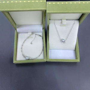 สร้อยคอจี้ไข่มุกแท้ 7-8 มม. น้ำทะเล ประดับเพชรทอง แสงออโรร่าสะท้อนเงา พร้อมตัวเรือนเงินและจี้ - Product Image 4