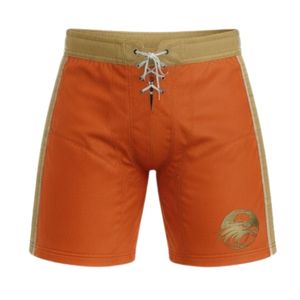 Shorts d'entraînement de hockey sur glace sublimés orange pour hommes, en polyester, avec cordon de serrage et bande latérale, vêtements de sport pour matchs d'équipe - Product Image 1