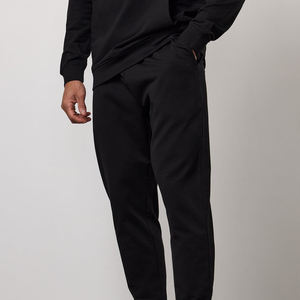 Pantalones Deportivos Unisex de Algodón Negro, Pantalones de Chándal de Color Sólido, Cintura Elástica, Bolsillos Laterales, Ropa Casual de Invierno con Capucha - Product Image 3
