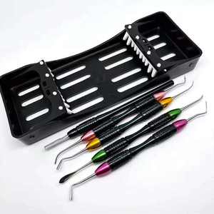 Kit de Restauration Dentaire Professionnel 4 Outils de Placement de Composite à Double Embout Boîte à Plateau Polymère Ventilée Manuel Certifié CE - Product Image 1