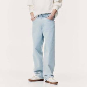 กางเกงยีนส์ทรงตรงผู้ชายแฟชั่นทันสมัย ผ้าโพลีเอสเตอร์ผสมคอตตอน เป็นมิตรต่อสิ่งแวดล้อม สไตล์ไฮสตรีท ทรงเข้ารูป แต่งขาด ดีไซน์เชือกผูก - Product Image 1