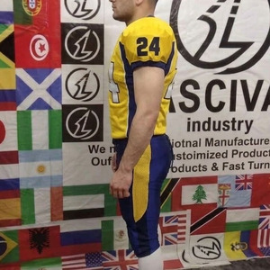 Uniforme de football américain avec design personnalisé pour l'équipe - Uniforme de football américain personnalisable - Design en maille jaune/bleue sublimé - Product Image 3