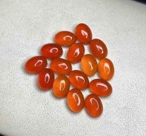 พลอยคาร์เนเลียนสีส้มธรรมชาติทรงรีแบบคาโบชอง หินขัดเงาสำหรับทำแหวน จี้ และเครื่องประดับ ขายส่ง - Product Image 3