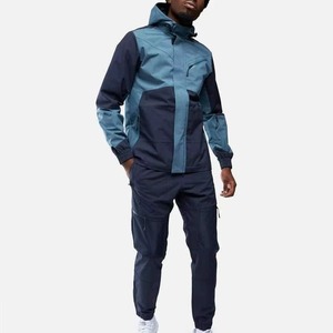 Survêtement coupe-vent pour homme de haute qualité, ensemble 2 pièces, logo personnalisé, fermeture éclair, nylon, prix de gros - Product Image 1