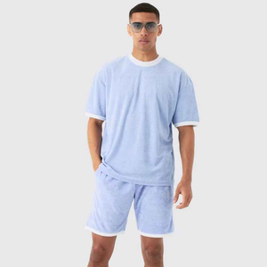 Nouvel ensemble sportif d'été pour homme, 100% coton, décontracté, respirant, en tissu éponge, 2 pièces, couleur unie, taille élastique, avec logo, manches courtes - Product Image 1