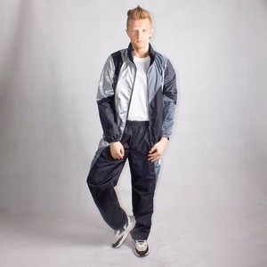 Conjunto Deportivo Unisex Impermeable con Capucha y Bloques de Color, Chaqueta Ligera de Poliéster de Longitud Completa con Bolsillos Laterales, Estilo Casual para Primavera - Product Image 1